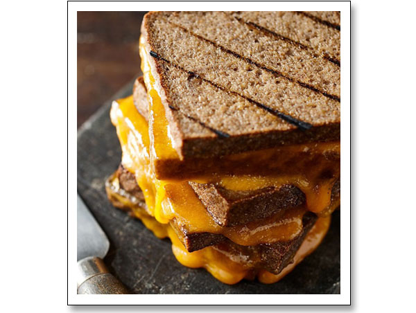 three grilled cheese sandwiches