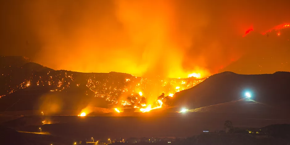 wildfire rages through landscape