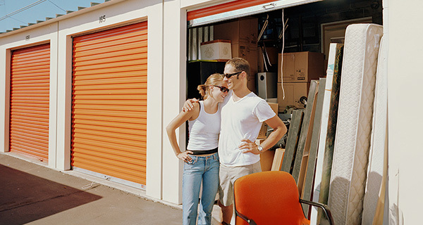 couple in front of storage unit