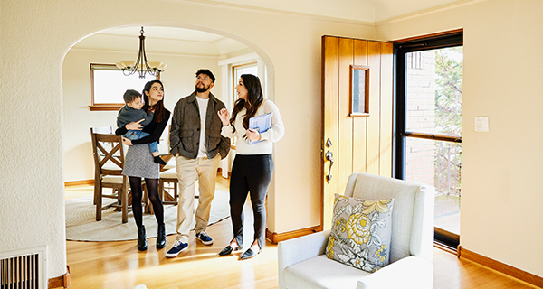family viewing home interior