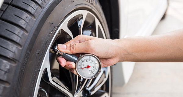 checking tire pressure